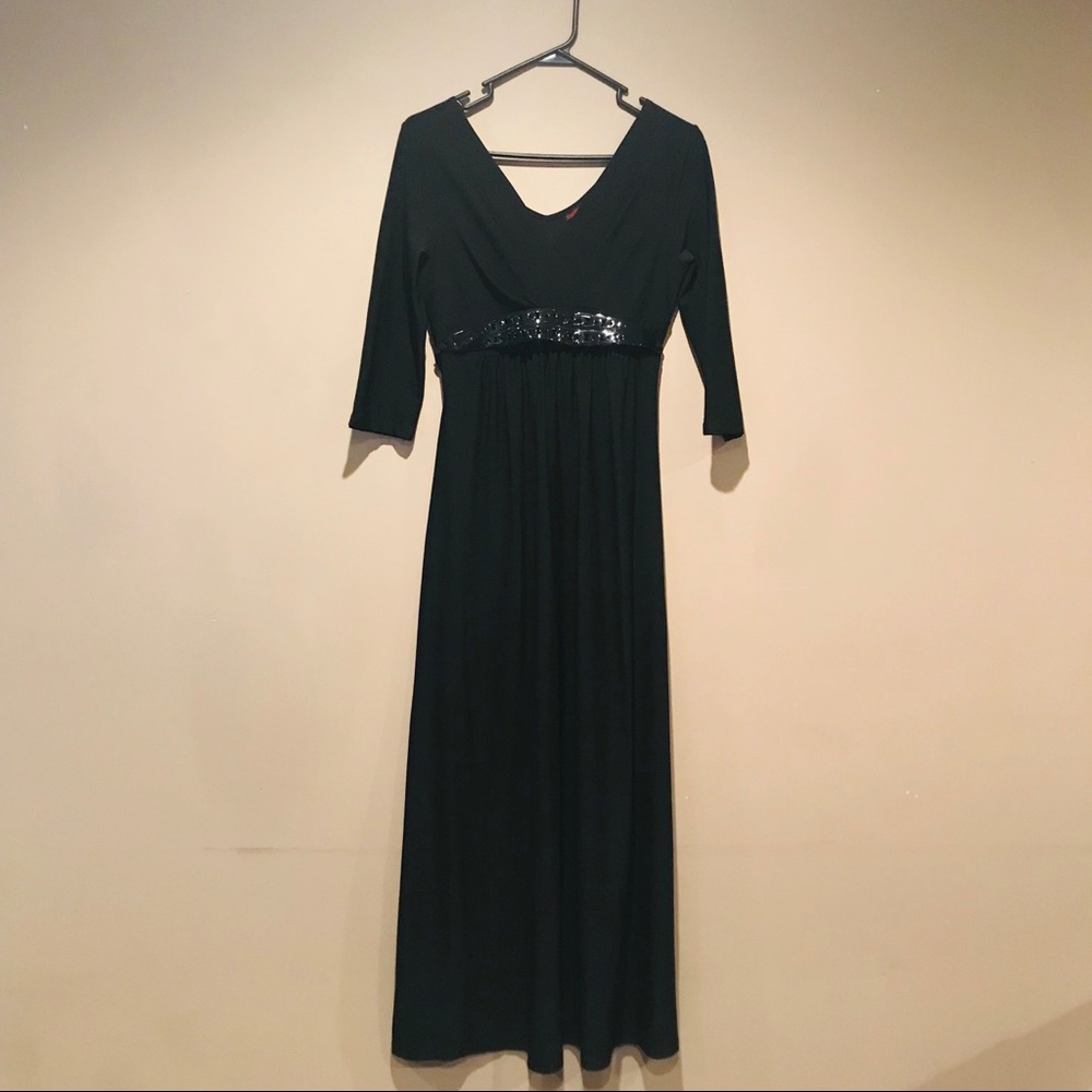 Long black dress with attached belt.